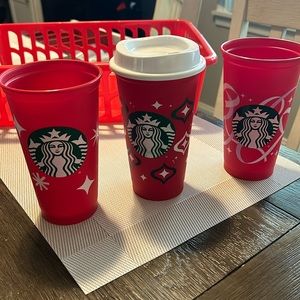Three Starbucks holiday cups
